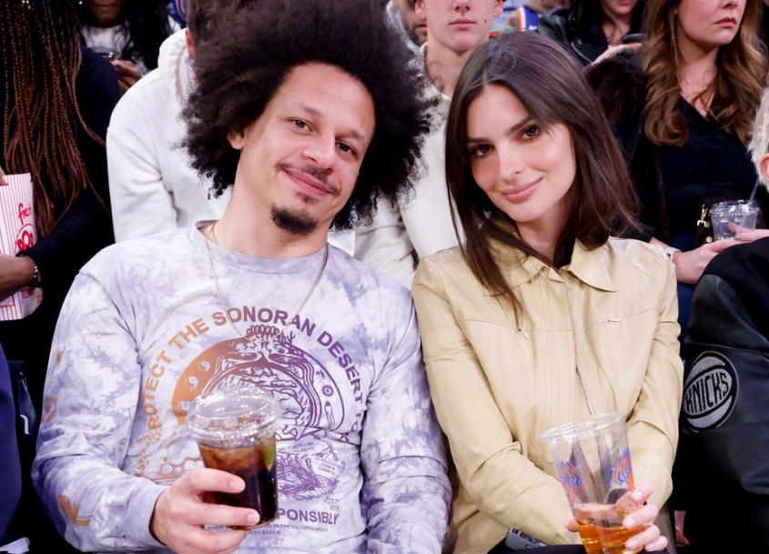 Eric André and Emily Ratajkowski sitting together