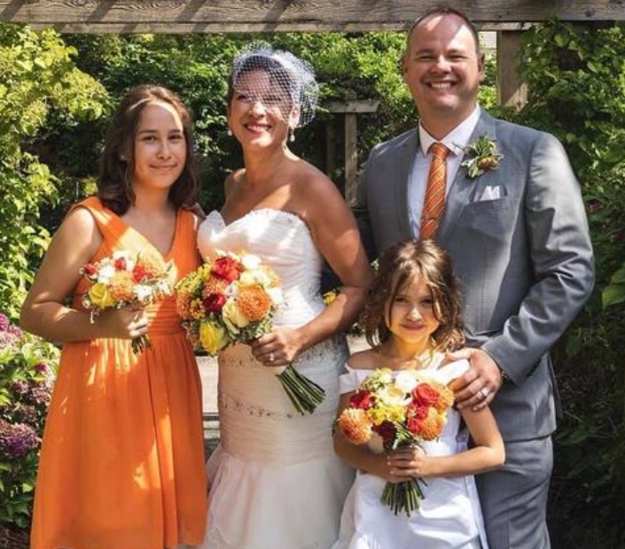 Melanie Mark with her husband, Cassidy and their kids