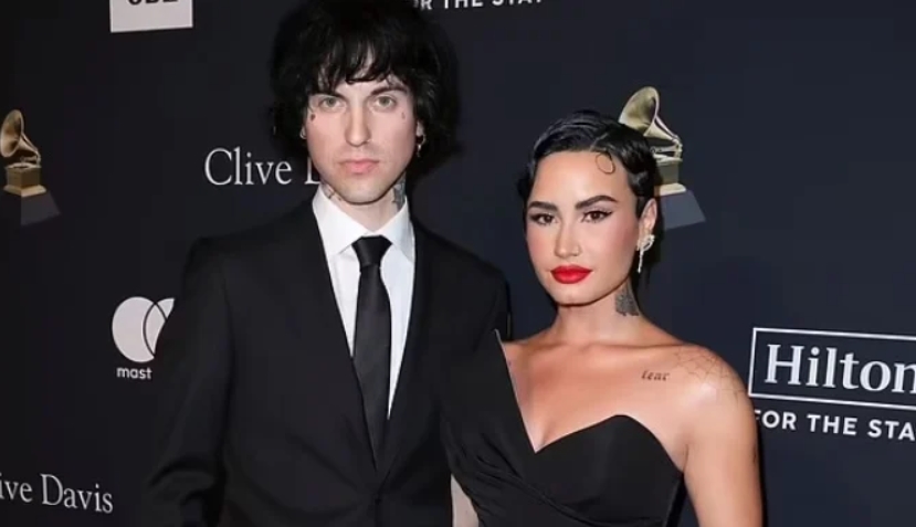 Demi Lovato, Jordan Lutes make PDA-filled red carpet debut at pre-Grammy gala