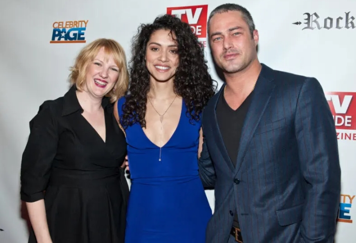 Robyn Coffin alongside Miranda Rae Mayo and Taylor Kinney