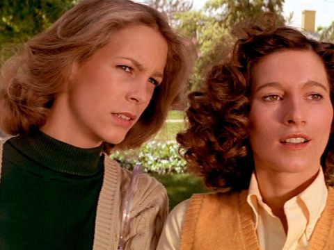 Nancy Kyes on right in a yellow shirt with Jamie Lee Curtis.