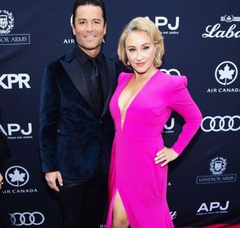 Yannick Bisson and his wife attending an event. 