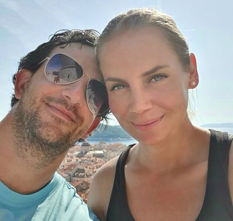 Jelena Dokic in a blue t-shirt with her boyfriend Tim Bikic.