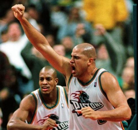 Bison Dele playing NBA for Detroit Pistons. 
