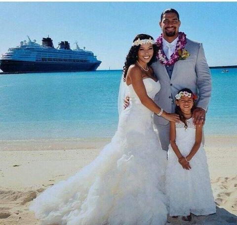 Joelle Anoa'i in a white dress at her parents wedding.