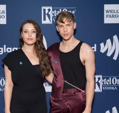 Openly gay  Tommy Dorfman alongside Hannah Baker's actor Katherine Langford at an event.