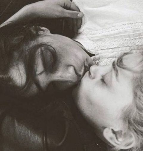 Valeriya Karaman kissing a girl.