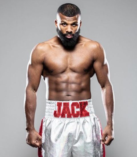 Badou Jack giving a pose in his boxing costume.