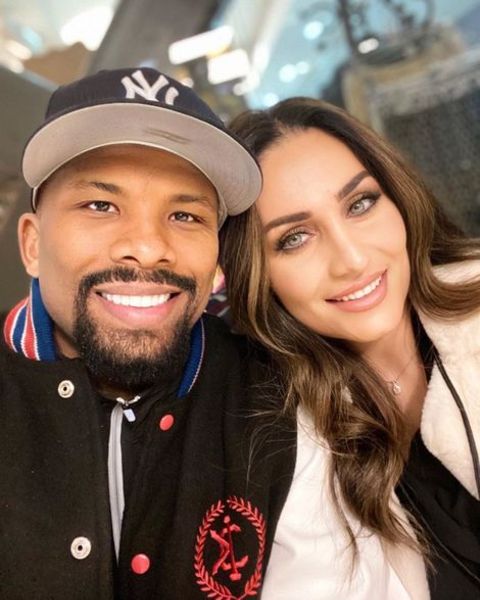 Badou Jack giving a pose along with his wife, Yasemin Jack.