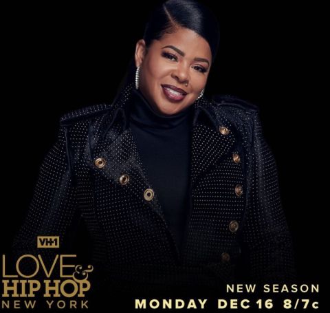 Chrissy Lampkin in a black dress poses at the cover of VH1 series Love and Hip Hop: New York