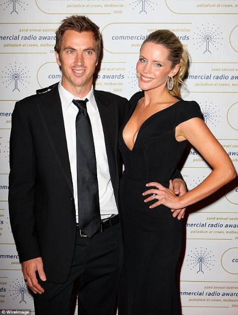 Sophie Falkiner giving a pose along with her ex-husband, Tony Thomas in an event.