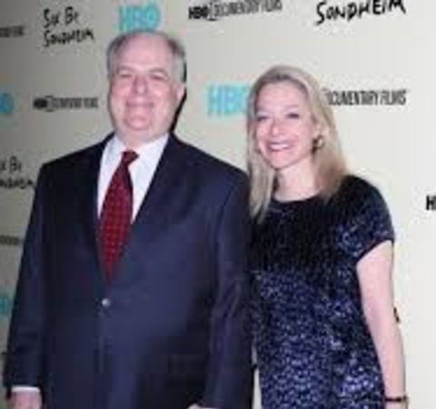 Alex Witchel in black dress poses with her multi-millionaire husband Frank Rich.
