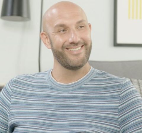Rich Kleiman in a grey t-shirt caught on camera during an interview.