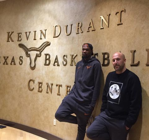 Rich Kleiman poses alongside Kevin Durant in front of Kevin Durant Basketball Center.