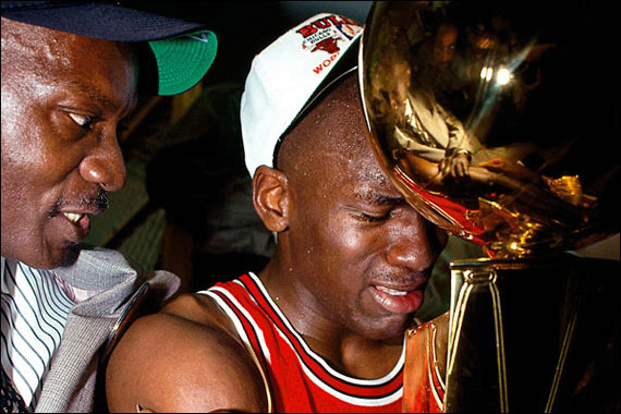 MJ's father James comforts MJ after winning his first NBA Title
