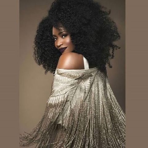 Teyonah Parris giving a pose in a photoshoot.