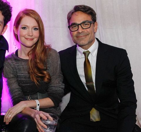 Darby Stanchfield with her husband Paul Stanchfield pose for a picture.