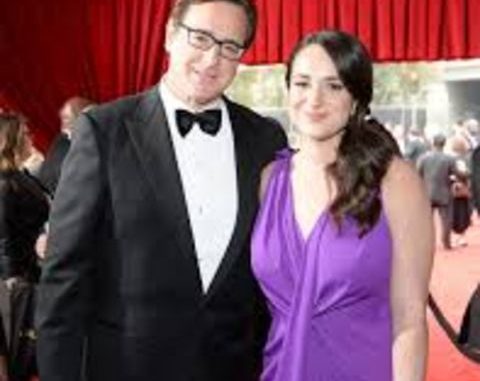 Lara Melanie Saget in purple dress with dad Bob Saget