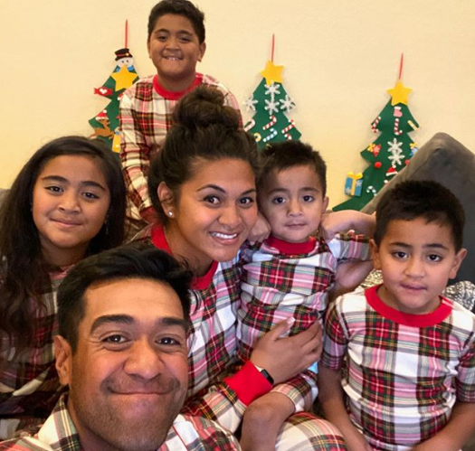 Tony Finau With His Wife And Child