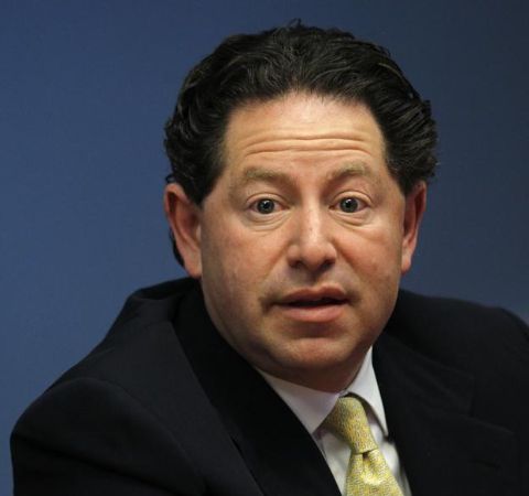 Robert Kotick in a black suit poses for a picture.