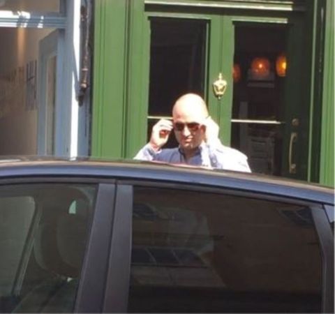 James Richman caught on camera while entering his car.