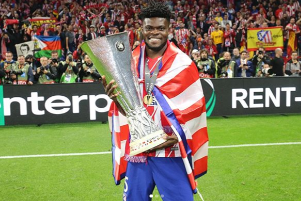Thomas Partey Holding The Trophy