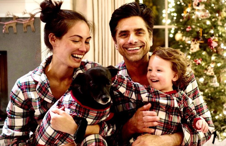 Caitlin McHugh with her husband and kid