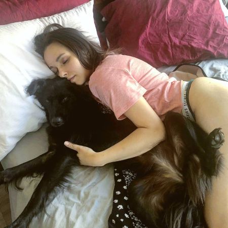 Katherine Ramdeen poses a picture with her dog.