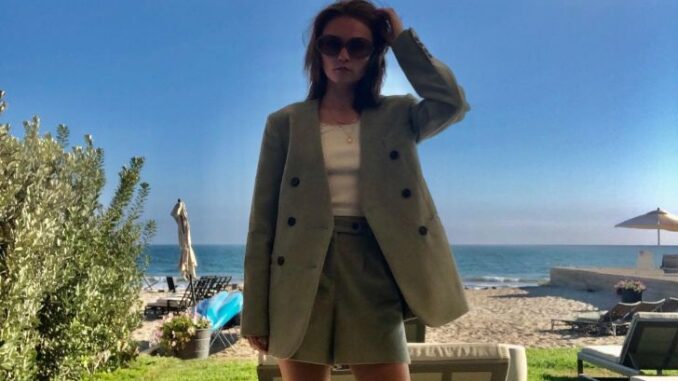 Jessica Barden taking picture by the Beach