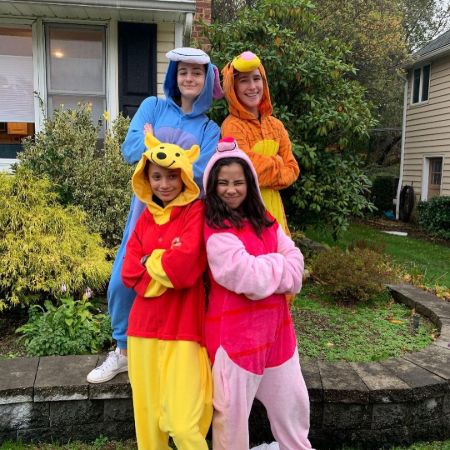 Tess Romero with her friends wearing fury suits