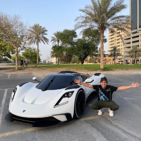 Nik Hirschi in front of his Ares S1 Hypercar