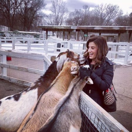 Tracey Anthony having fun visiting goats.