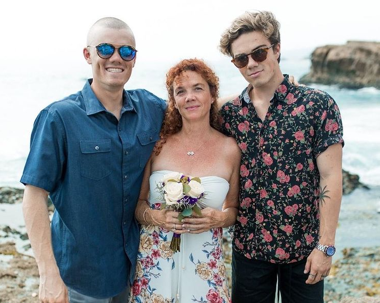 Jordan Beau with his mom and sibling