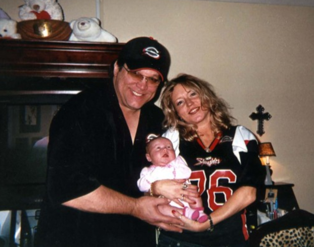 Steve McMichael and his wife with their kid