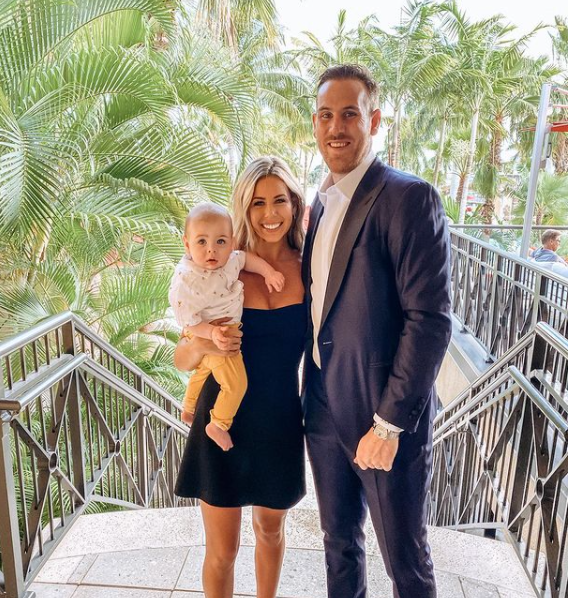 Jimmy Hayes with his wife and their kid