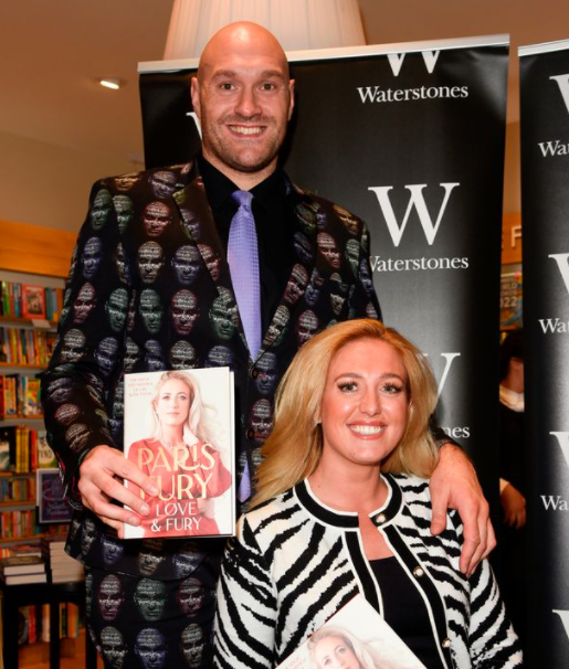 Paris Fury alongside her husband and her new book
