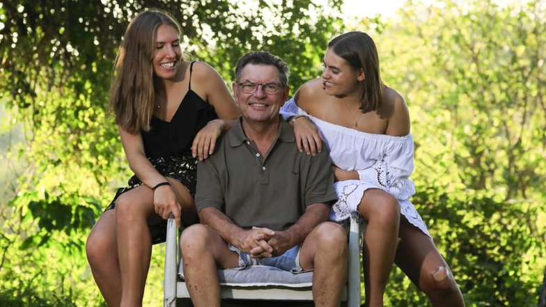 Steve Price with his daughters, Kate and Lucy