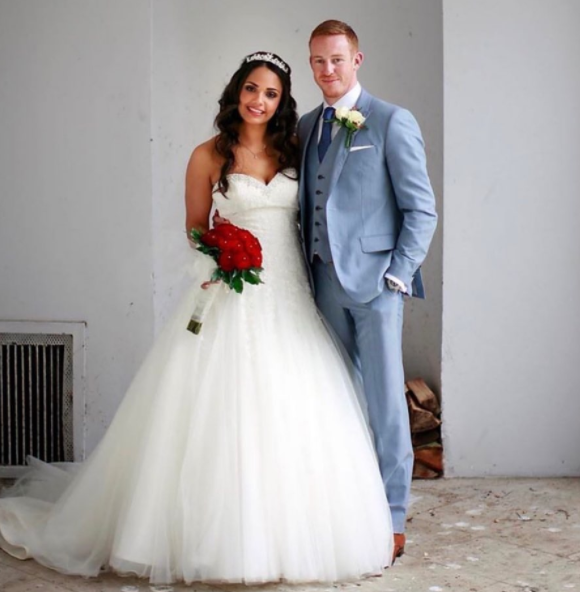 Adam Rooney and his wife