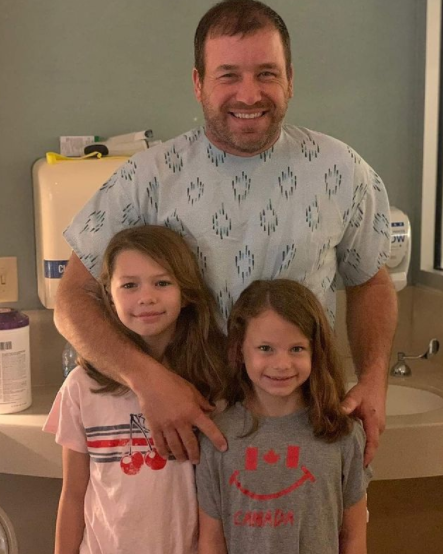 Ryan Newman with his daughters