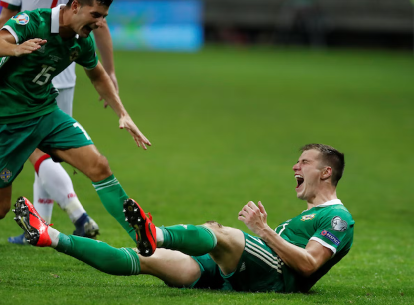 Paddy McNair celebrating after scoring a goal