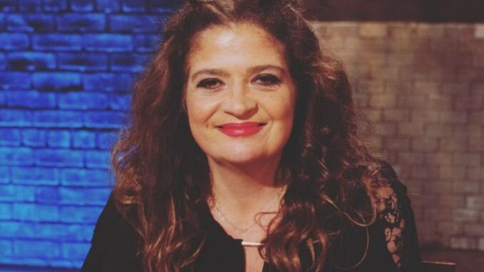 Alex Guarnaschelli smiling for a photo.