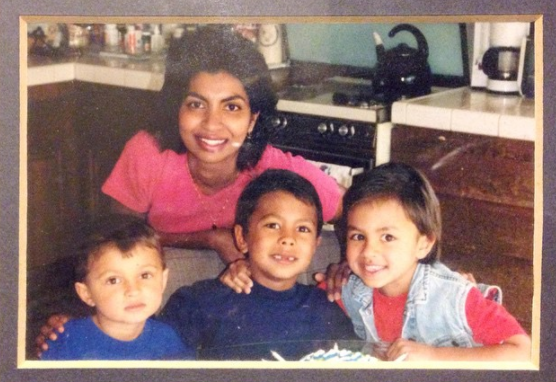 Aaron Clancy with his mom and two siblings