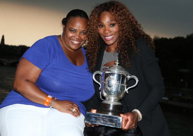 Isha Price and her half-sister, Serena williams with French Open Trophy
