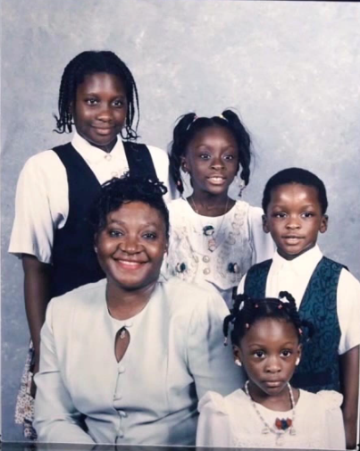 Victor Oladipo with his mom and siblings