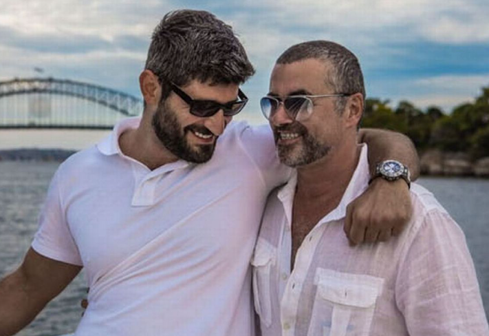 George Michael and his partner, Fadi