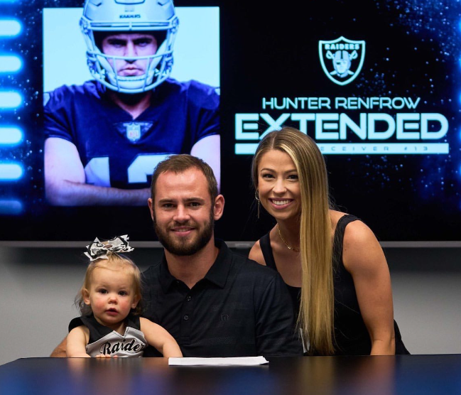 Hunter Renfrow with his wife and their daughter