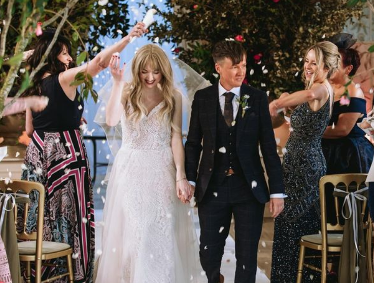 Zoe is married to his partner, Jenna Robinson