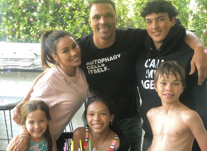 October Gonzalez with her husband and kids