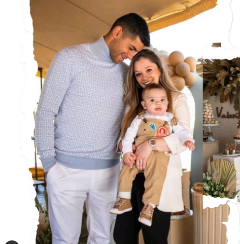 Cristian Romero with his wife and their baby