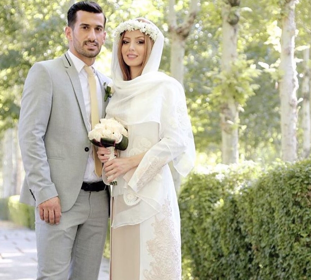 Ehsan Hajsafi and his beautiful wife 